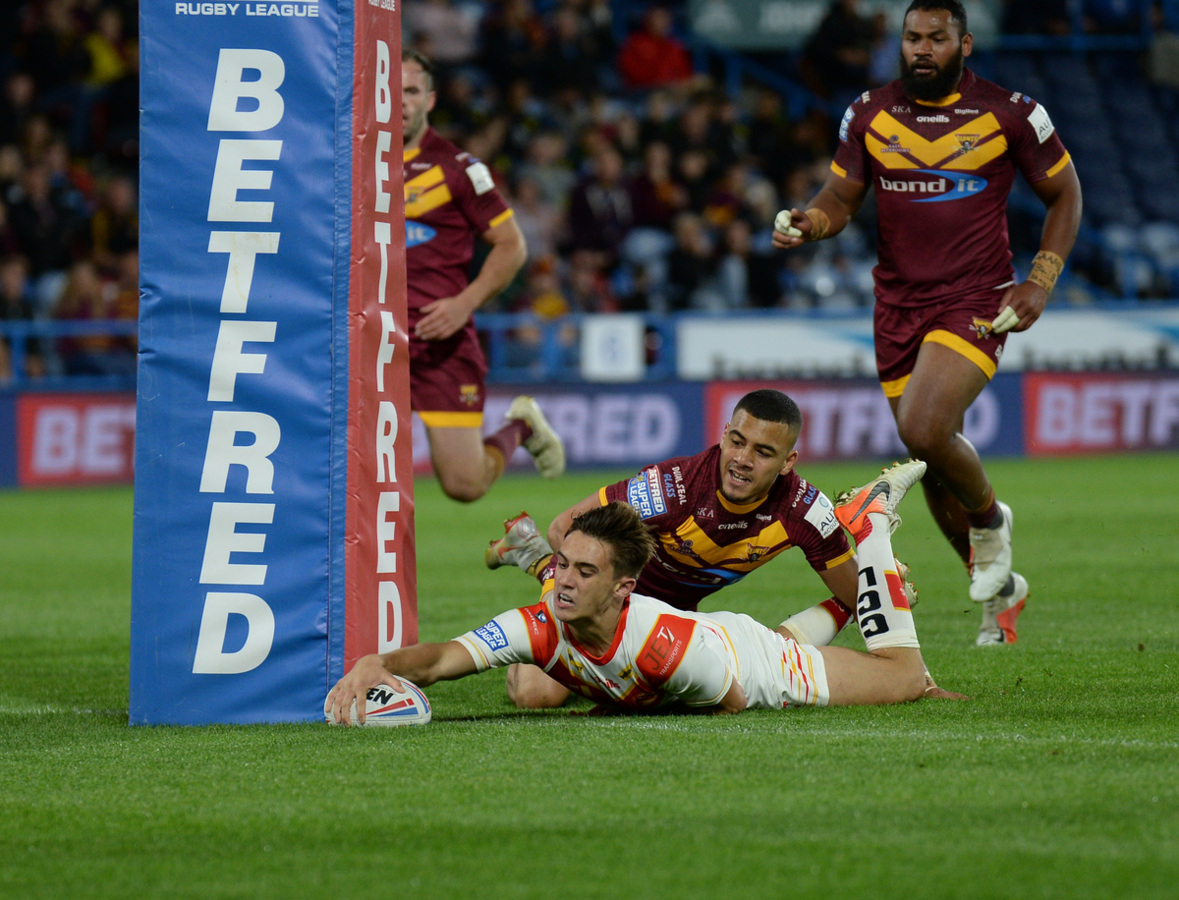Mourgue reaches over to score